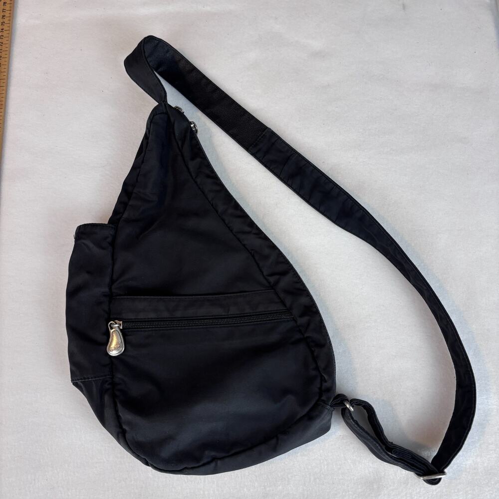 AmeriBag Healthy Back Bag Black Nylon Sling Backpack Crossbody Bag Multi Pocket